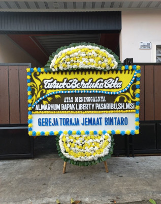 Papan Bunga Duka di Adian Koting